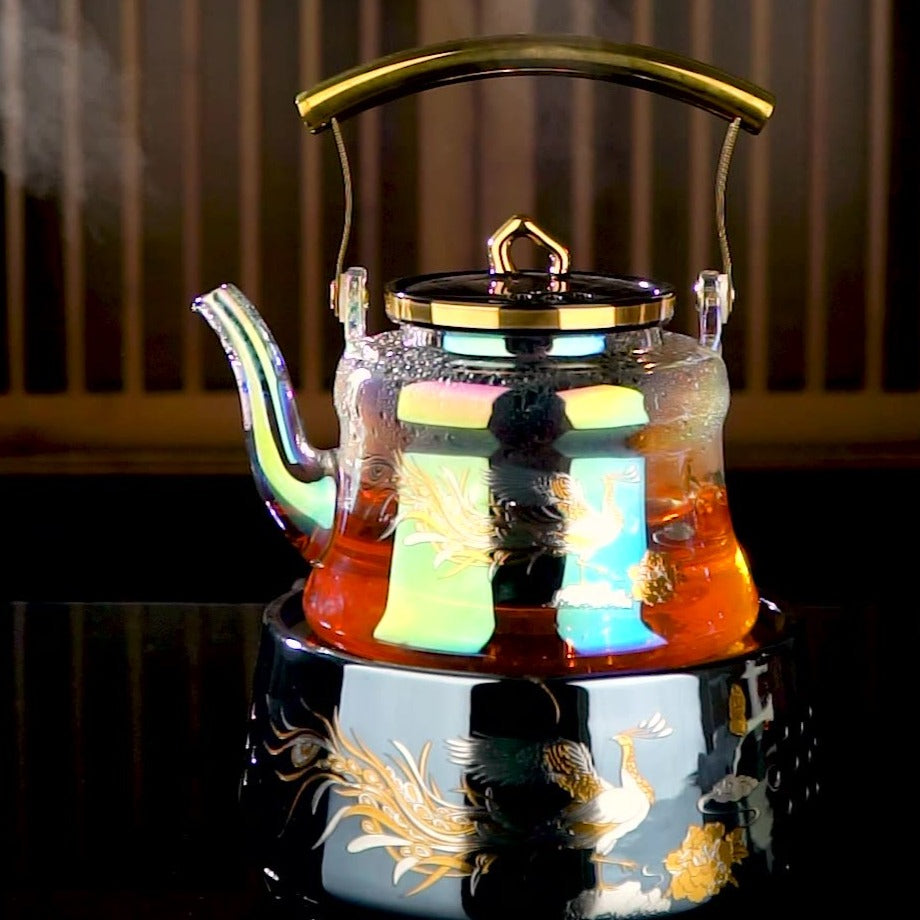https://sakeoni.com/cdn/shop/files/borosilicate-glass-tea-kettle-phoenix-1_1445x.jpg?v=1689432800