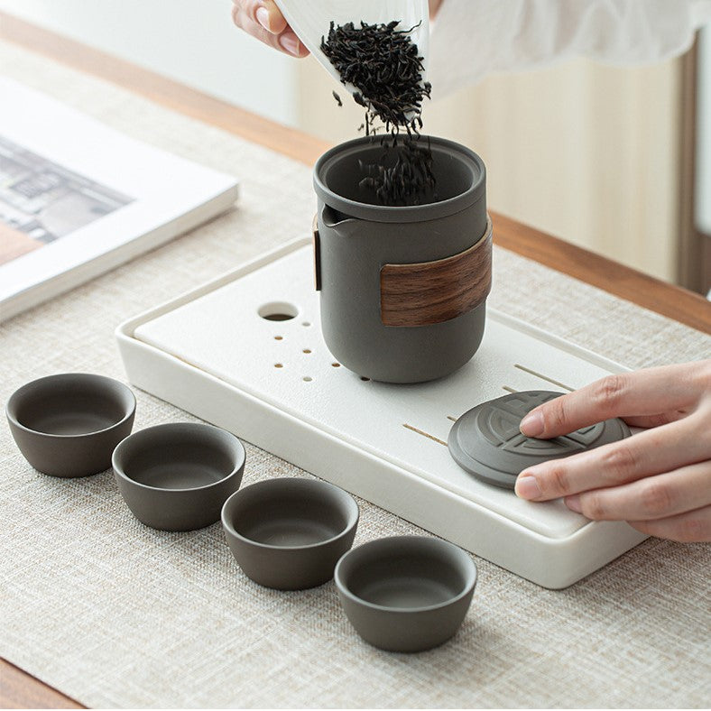 https://sakeoni.com/cdn/shop/products/purple-clay-travel-tea-set-9_1445x.jpg?v=1656999702